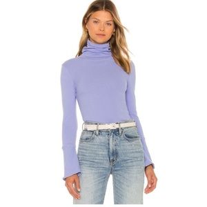 Free people periwinkle blue top. Bell sleeve. NWT Size Large Spring season